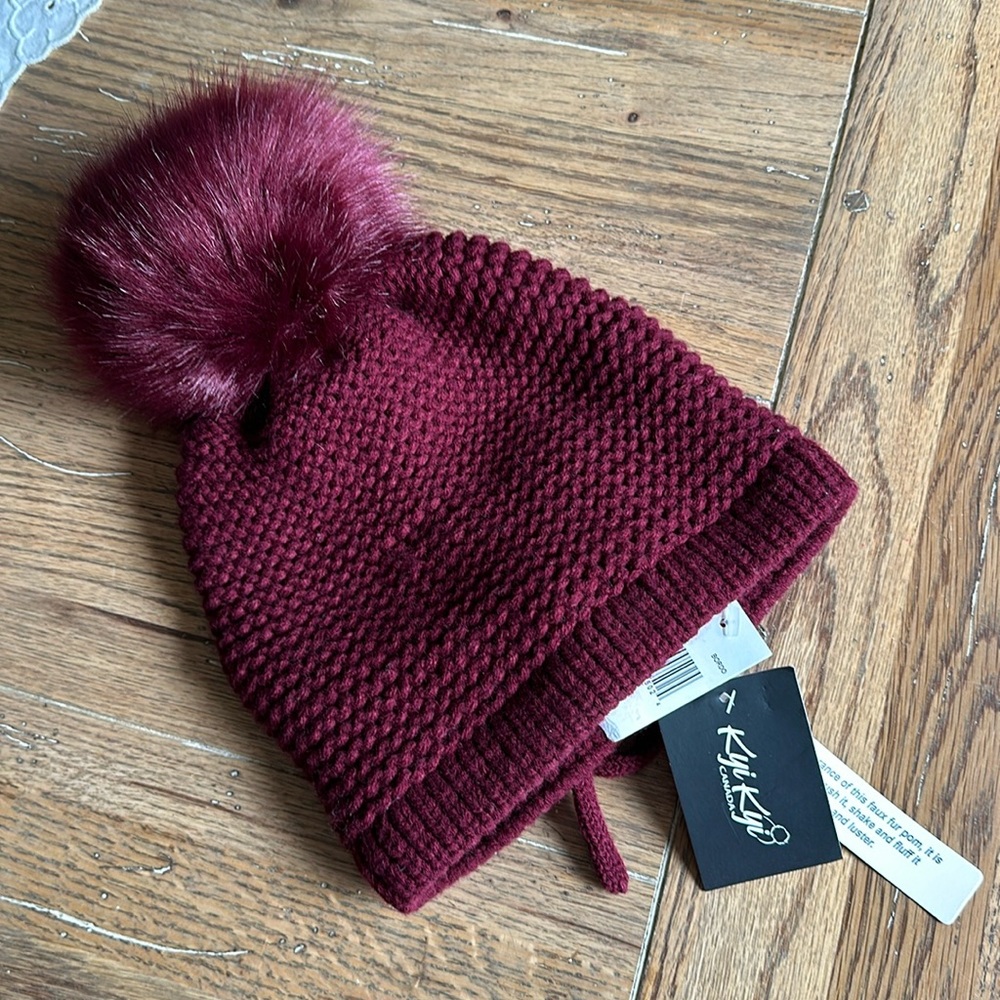 NWT KYI KYI faux fur Pom Pom beanie with tie in back! One size. Made in Canada!